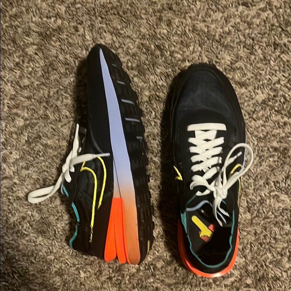 Vibrant Black Sneakers with Multicolor Sole